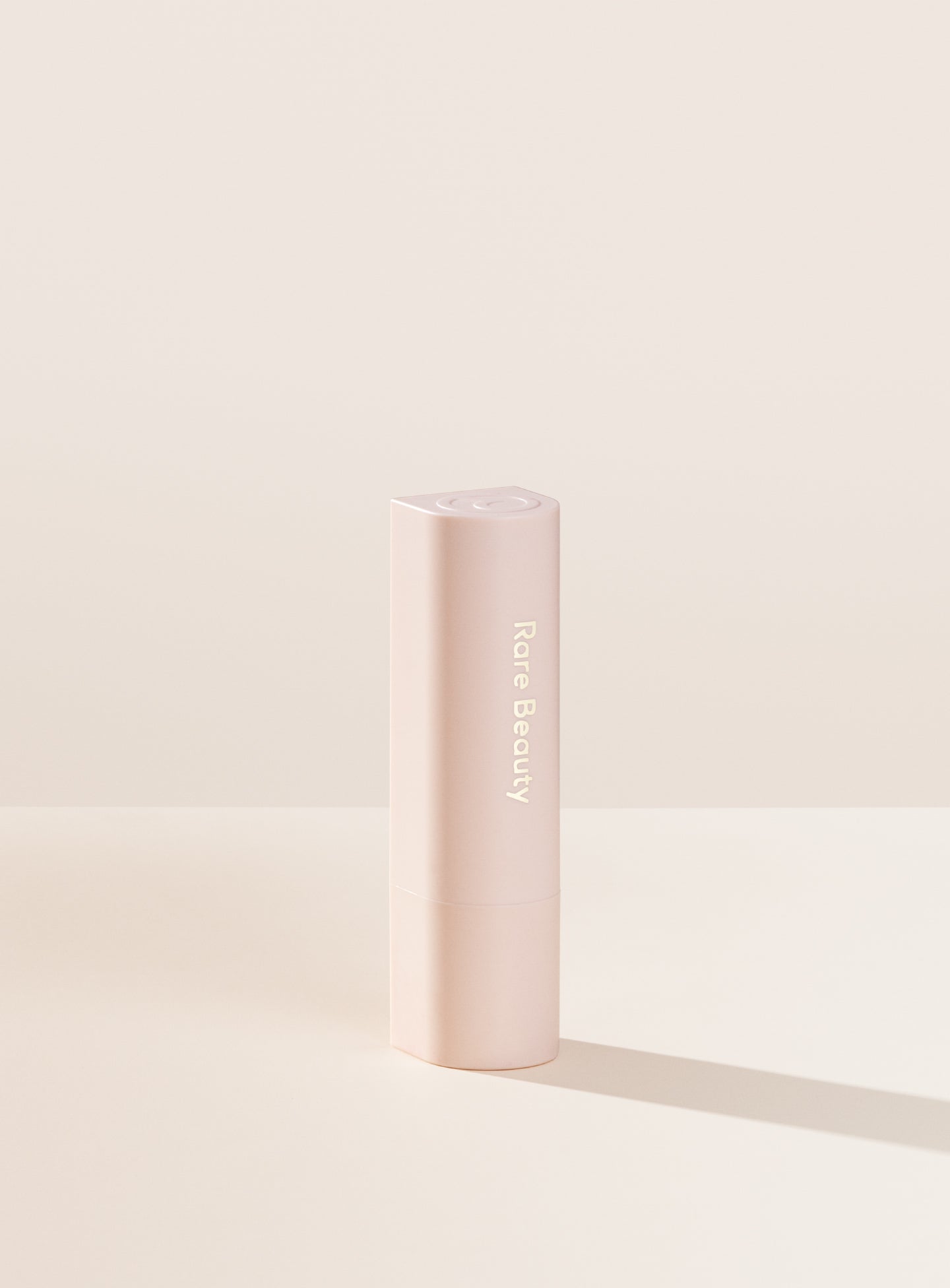 RARE BEAUTY with gratitude dewy lip balm SUPPORT ...A hydrating lip balm with a kiss of dewy, buildable color that looks and feels so good your lips will thank you.